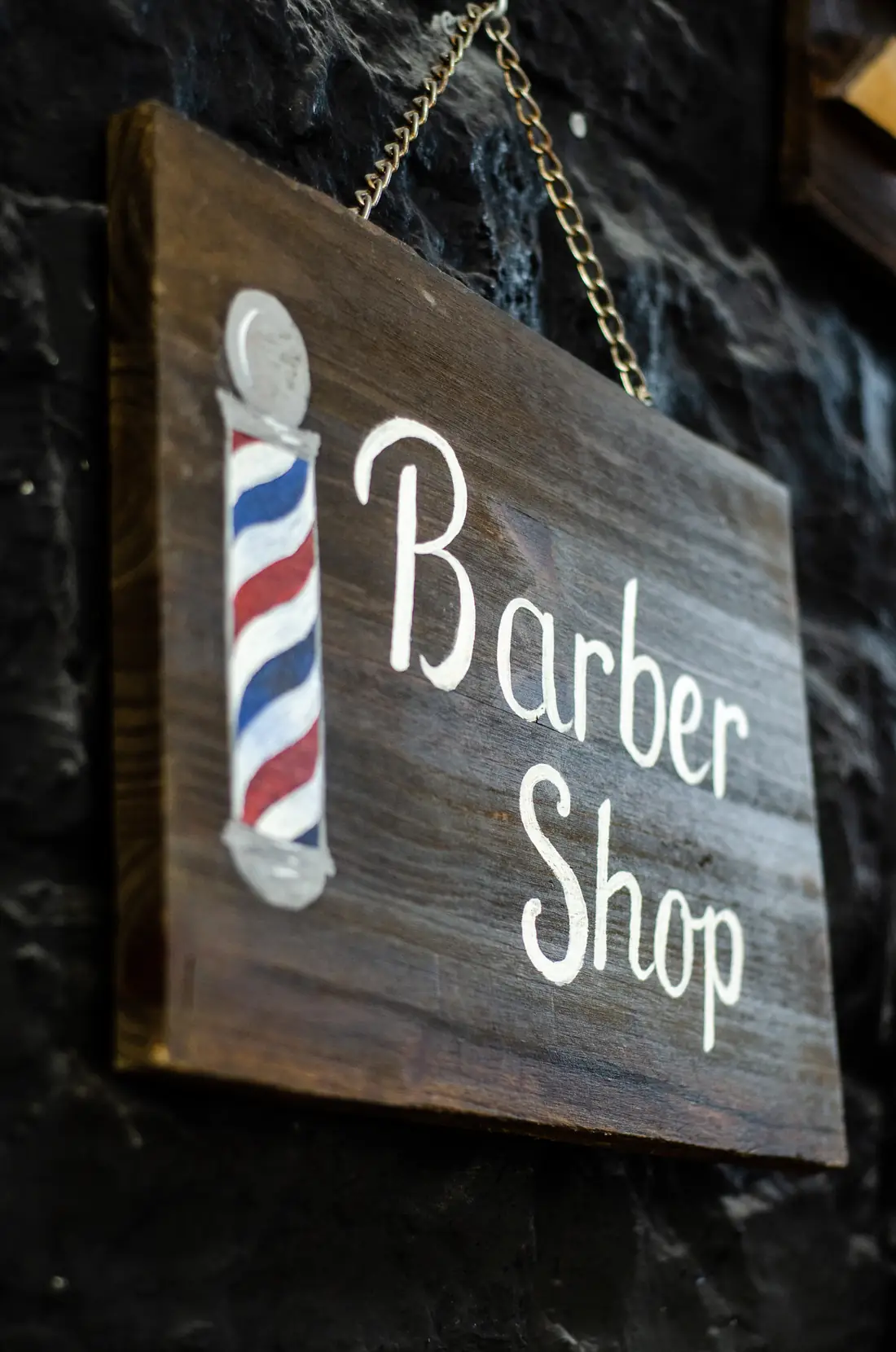 Cartel de Barber Shop en el local de Valencia